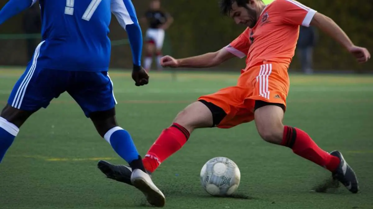 A soccer player nutmegging an
opponent.